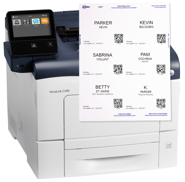 Example of a laser printer and sheet on top with print-out of badges